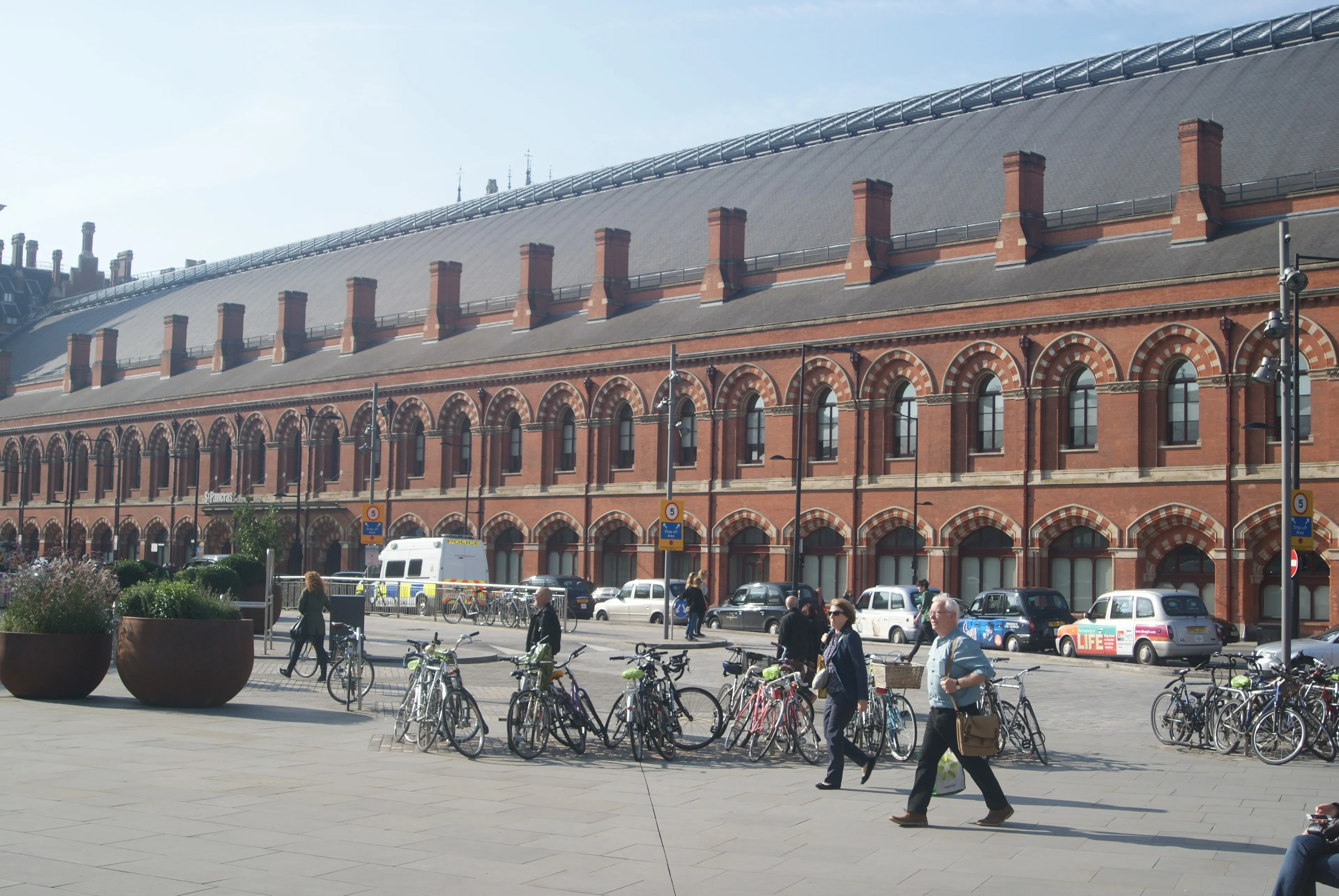 The red-brick facade of St Pancras station viewed from outside King's Cross