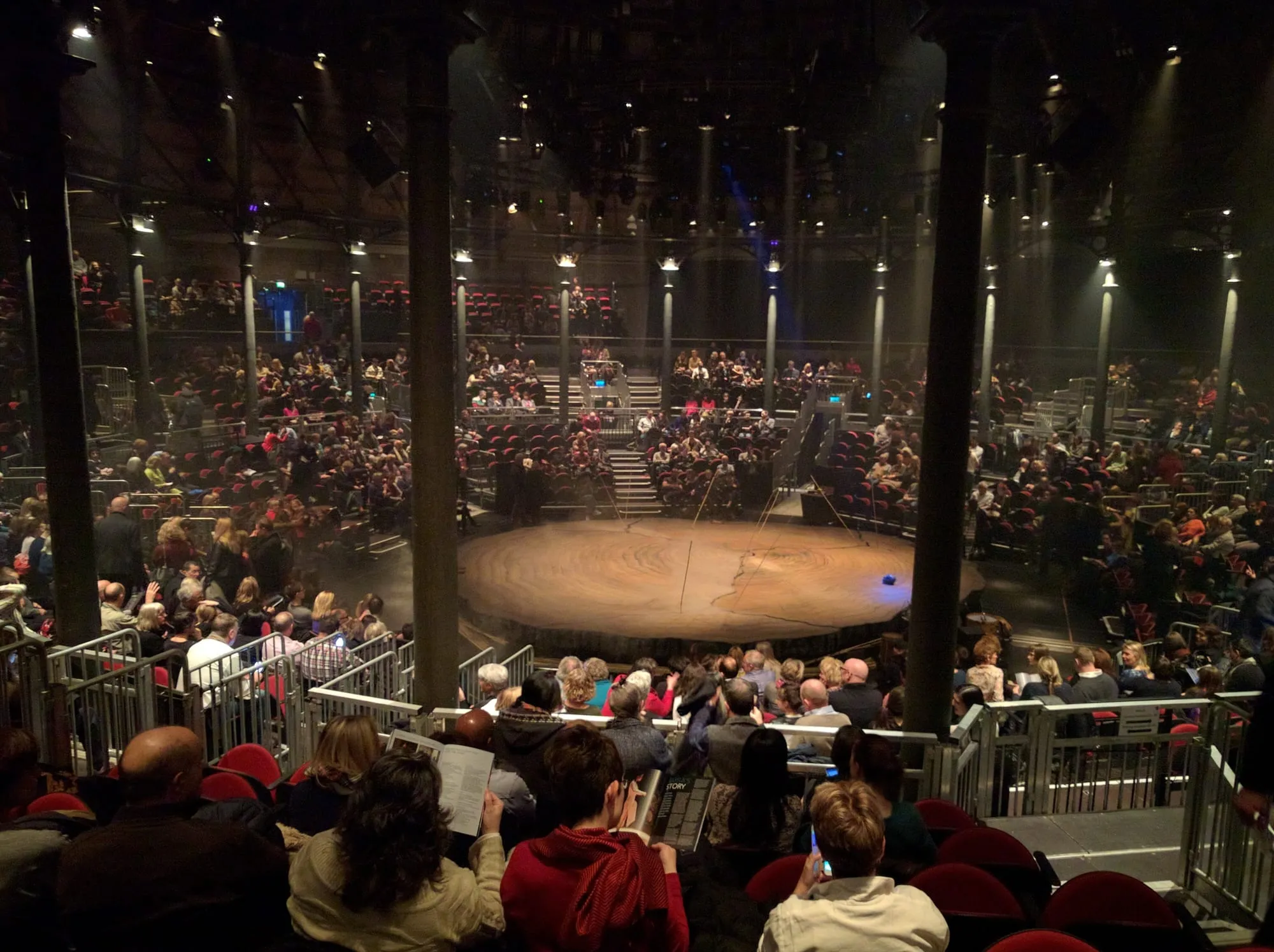 The interior of the Roundhouse, its iron columns and circular gallery rising above the floor
